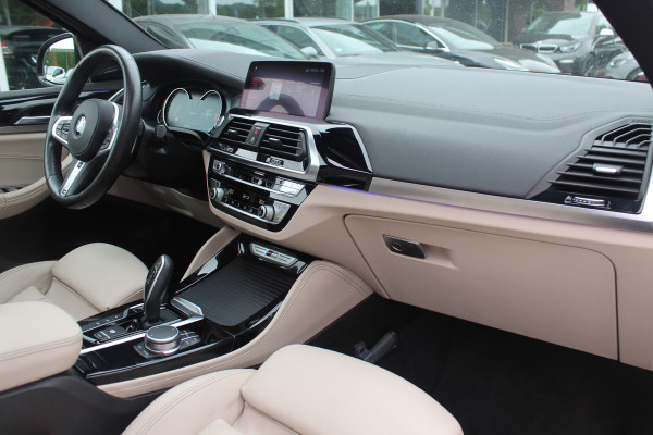 BMW X4 M40i High Exe. M Sport 73.952 km NL Auto. / Trekhaak / Panoramadak / Camera / Head-up / Luxe Leder / 21'' / Harman Kardon / Navigatie / Stuur+Stoelverwarming / DAB / Dodehoek / Cruise Control