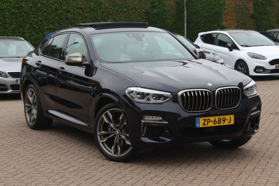 BMW X4 M40i High Exe. M Sport 73.952 km NL Auto. / Trekhaak / Panoramadak / Camera / Head-up / Luxe Leder / 21'' / Harman Kardon / Navigatie / Stuur+Stoelverwarming / DAB / Dodehoek / Cruise Control