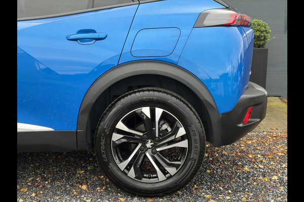 Peugeot 2008 1.2 PureTech Blue Lease Allure ✓2e Eigenaar✓360° Camera✓Draadloze telefoonlader✓Carplay✓6 bak✓Halfleder✓Navi✓Clima✓Cruise✓17'' Lmv✓Rijstrooksensor✓102pk✓Dealer onderhouden✓N.A.P✓Apk tot 04-2027