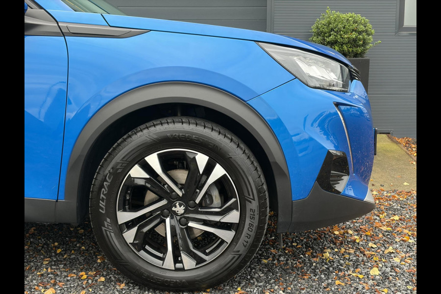 Peugeot 2008 1.2 PureTech Blue Lease Allure ✓2e Eigenaar✓360° Camera✓Draadloze telefoonlader✓Carplay✓6 bak✓Halfleder✓Navi✓Clima✓Cruise✓17'' Lmv✓Rijstrooksensor✓102pk✓Dealer onderhouden✓N.A.P✓Apk tot 04-2027