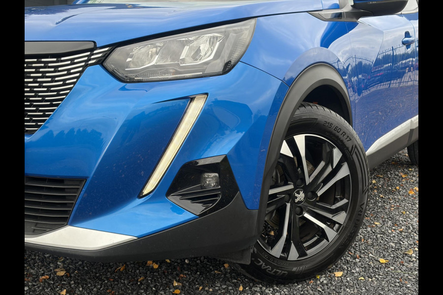 Peugeot 2008 1.2 PureTech Blue Lease Allure ✓2e Eigenaar✓360° Camera✓Draadloze telefoonlader✓Carplay✓6 bak✓Halfleder✓Navi✓Clima✓Cruise✓17'' Lmv✓Rijstrooksensor✓102pk✓Dealer onderhouden✓N.A.P✓Apk tot 04-2027