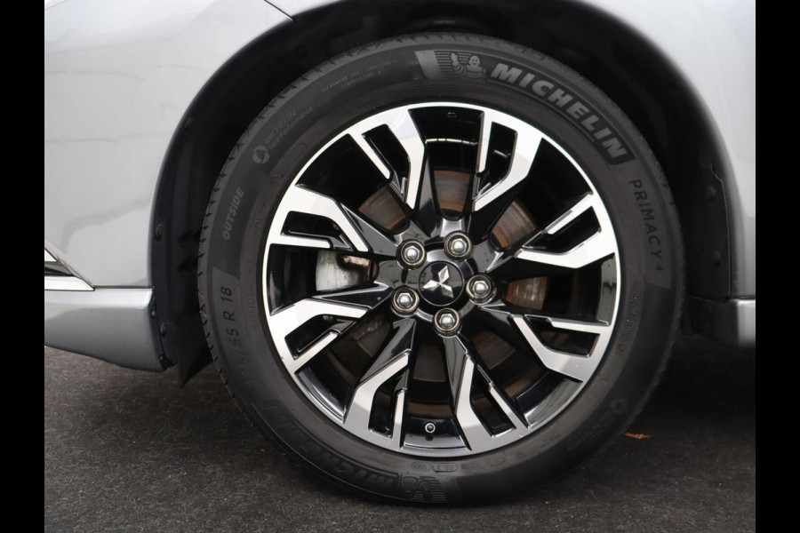 Mitsubishi Outlander 2.4 PHEV Pure+ | SOH 71,8% | Leder | Trekhaak | Cruise control | Stuur/stoelverwarming | Doedehoek detectie | 360 camera | Bluetooth | Climate control