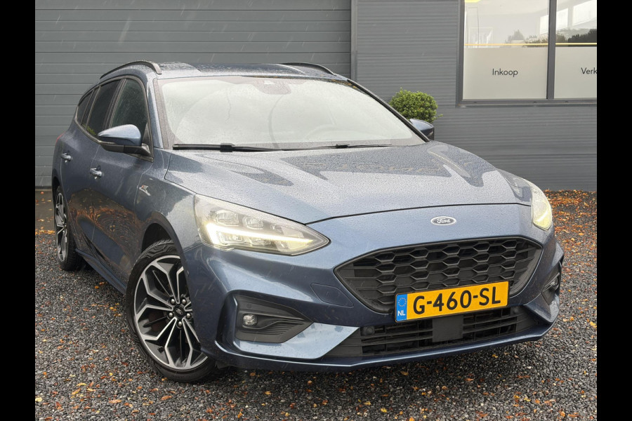Ford FOCUS Wagon 1.0 EcoBoost ST Line Business ✓2e Eigenaar✓Carplay✓Trekhaak✓Camera✓Keyless✓Stoelverw✓Clima✓Cruise✓Dealer Onderhouden✓Recent beurt gehad✓PDc V+A✓6 Bak✓125pk✓Lm velgen✓Bj 11-2019✓N.A.P✓Apk tot 01-2029