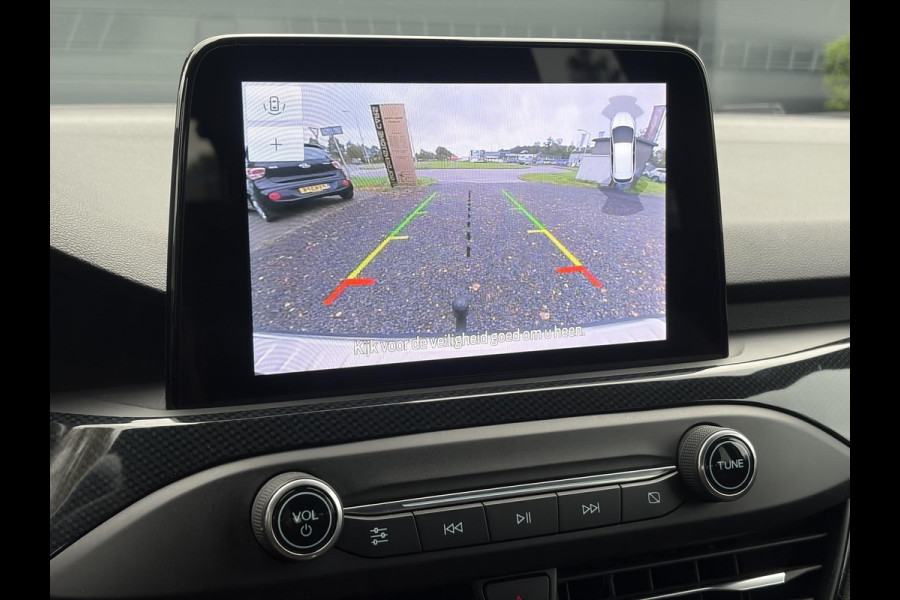 Ford FOCUS Wagon 1.0 EcoBoost ST Line Business ✓2e Eigenaar✓Carplay✓Trekhaak✓Camera✓Keyless✓Stoelverw✓Clima✓Cruise✓Dealer Onderhouden✓Recent beurt gehad✓PDc V+A✓6 Bak✓125pk✓Lm velgen✓Bj 11-2019✓N.A.P✓Apk tot 01-2029