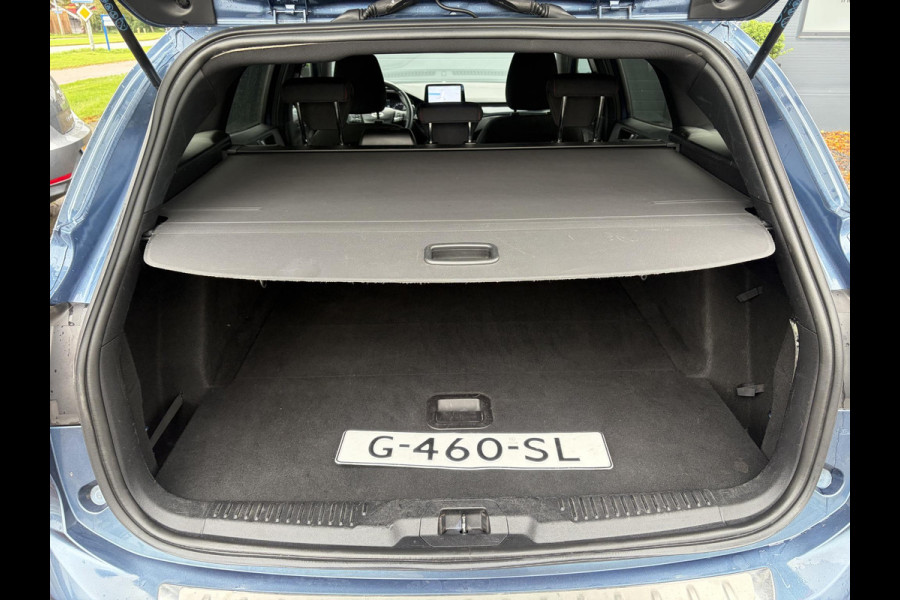 Ford FOCUS Wagon 1.0 EcoBoost ST Line Business ✓2e Eigenaar✓Carplay✓Trekhaak✓Camera✓Keyless✓Stoelverw✓Clima✓Cruise✓Dealer Onderhouden✓Recent beurt gehad✓PDc V+A✓6 Bak✓125pk✓Lm velgen✓Bj 11-2019✓N.A.P✓Apk tot 01-2029