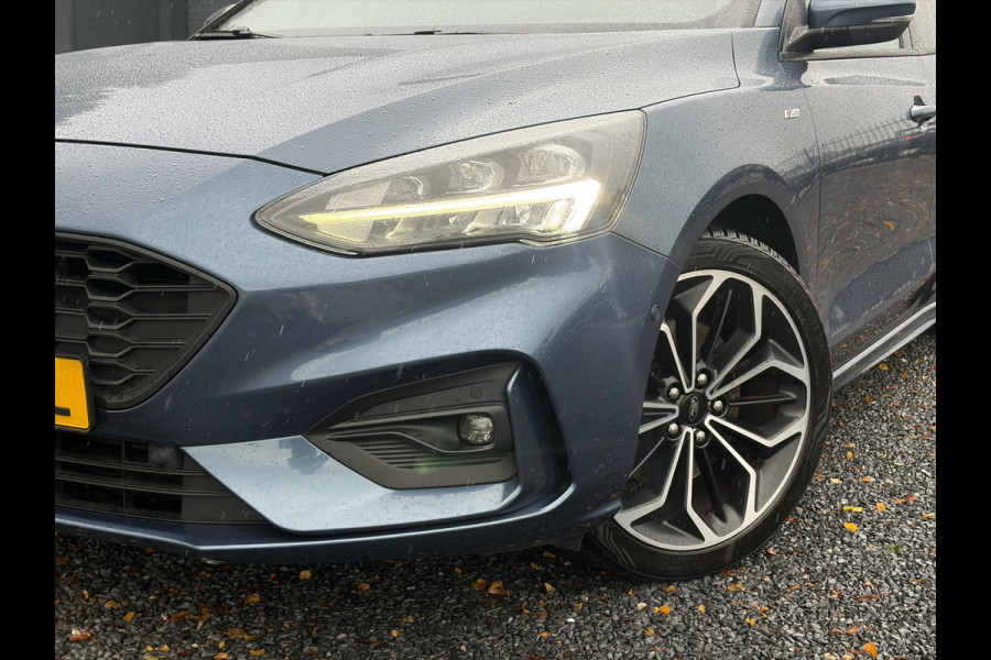 Ford FOCUS Wagon 1.0 EcoBoost ST Line Business ✓2e Eigenaar✓Carplay✓Trekhaak✓Camera✓Keyless✓Stoelverw✓Clima✓Cruise✓Dealer Onderhouden✓Recent beurt gehad✓PDc V+A✓6 Bak✓125pk✓Lm velgen✓Bj 11-2019✓N.A.P✓Apk tot 01-2029