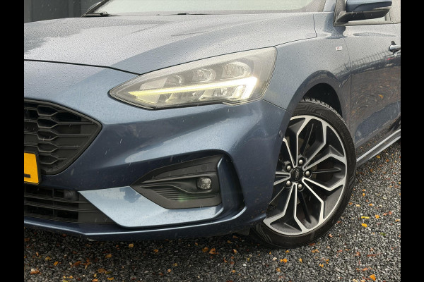 Ford FOCUS Wagon 1.0 EcoBoost ST Line Business ✓2e Eigenaar✓Carplay✓Trekhaak✓Camera✓Keyless✓Stoelverw✓Clima✓Cruise✓Dealer Onderhouden✓Recent beurt gehad✓PDc V+A✓6 Bak✓125pk✓Lm velgen✓Bj 11-2019✓N.A.P✓Apk tot 01-2029