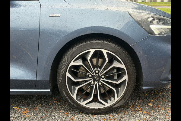 Ford FOCUS Wagon 1.0 EcoBoost ST Line Business ✓2e Eigenaar✓Carplay✓Trekhaak✓Camera✓Keyless✓Stoelverw✓Clima✓Cruise✓Dealer Onderhouden✓Recent beurt gehad✓PDc V+A✓6 Bak✓125pk✓Lm velgen✓Bj 11-2019✓N.A.P✓Apk tot 01-2029