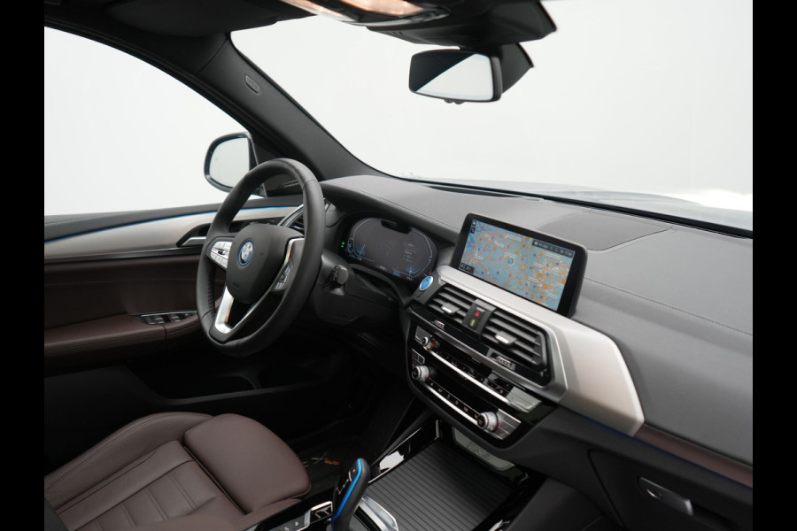 BMW iX3 High Executive 80 kWh 286pk Dealer O.H | SOH 95,5% | | Panodak | Head Up | Adaptive Cruise | 360 Camera | Harman / Kardon | Lederen Sportstoelen Memory & Verwarmd | Keyless | Apple Carplay | Blis | Sfeerverlichting | DAB | Navigatie | 20"L.M |
