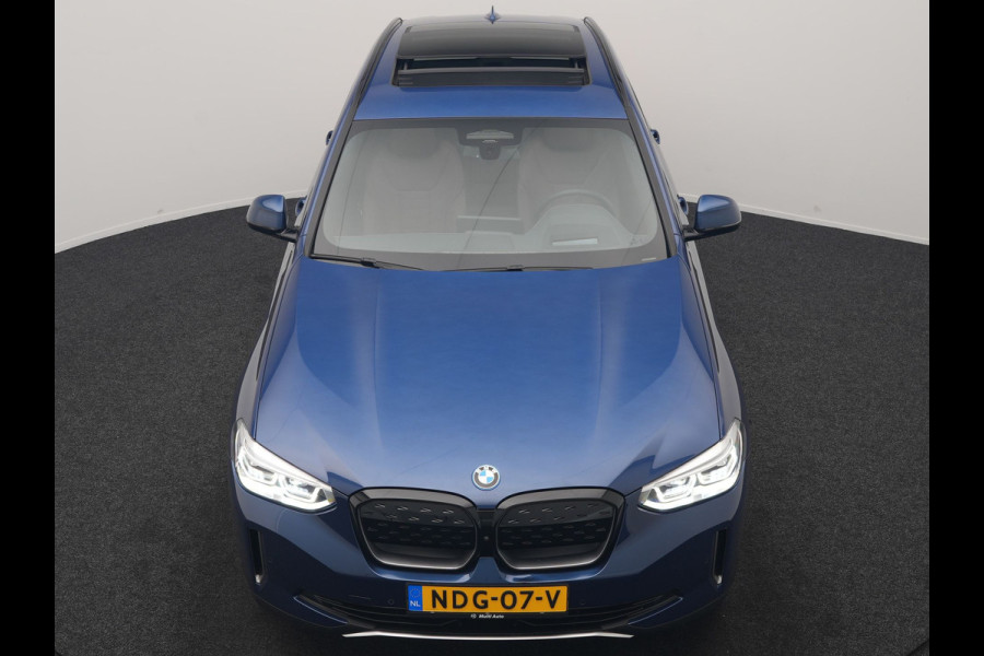 BMW iX3 High Executive 80 kWh 286pk Dealer O.H | SOH 95,5% | | Panodak | Head Up | Adaptive Cruise | 360 Camera | Harman / Kardon | Lederen Sportstoelen Memory & Verwarmd | Keyless | Apple Carplay | Blis | Sfeerverlichting | DAB | Navigatie | 20"L.M |