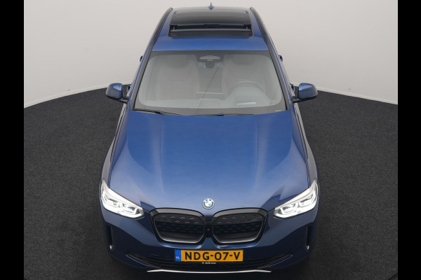 BMW iX3 High Executive 80 kWh 286pk Dealer O.H | SOH 95,5% | | Panodak | Head Up | Adaptive Cruise | 360 Camera | Harman / Kardon | Lederen Sportstoelen Memory & Verwarmd | Keyless | Apple Carplay | Blis | Sfeerverlichting | DAB | Navigatie | 20"L.M |