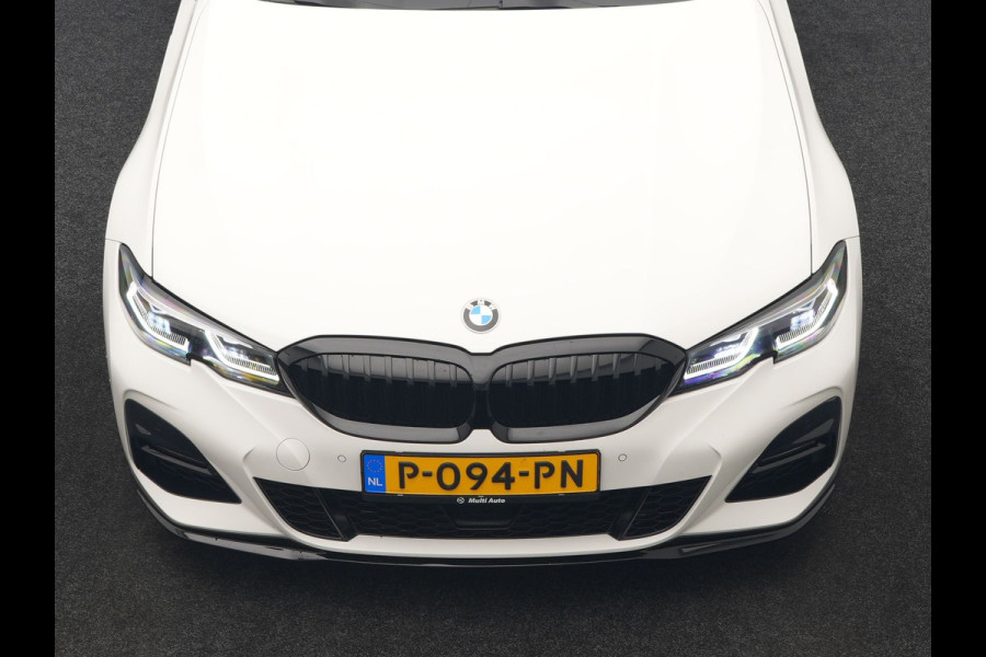 BMW 3 Serie Touring 320i M Sport Perfomance Parts 184pk | Panodak | Adaptive Cruise | Laser LED | Sportuitlaat Kleppen Besturing | Lederen Sportstoelen Verwarmd | Sfeerverlichting | Apple Carplay | 20"L.M | Navigatie | DAB |