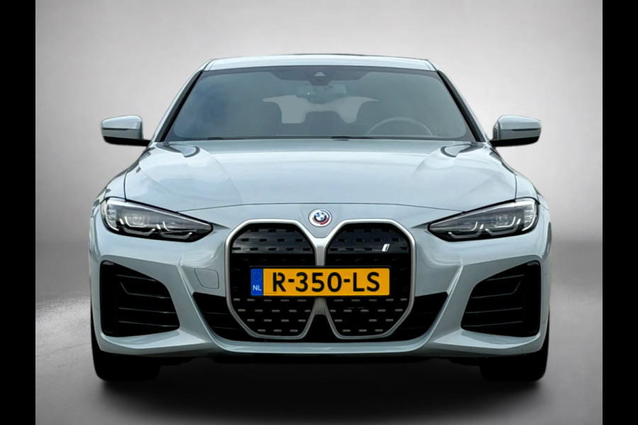 BMW i4 EDrive40 84 kWh M-sport 94% SOH (NL-auto,1e eig, Dealer OndH, Carplay, SfeerV, Trekhaak,Camera, Lane A, Active Cruise, Etc)