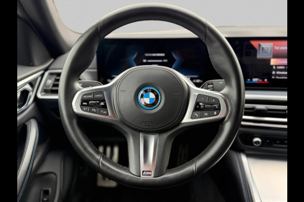 BMW i4 EDrive40 84 kWh M-sport 94% SOH (NL-auto,1e eig, Dealer OndH, Carplay, SfeerV, Trekhaak,Camera, Lane A, Active Cruise, Etc)