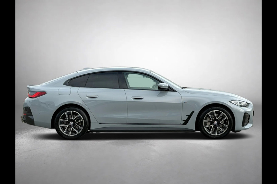 BMW i4 EDrive40 84 kWh M-sport 94% SOH (NL-auto,1e eig, Dealer OndH, Carplay, SfeerV, Trekhaak,Camera, Lane A, Active Cruise, Etc)