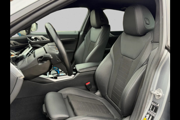 BMW i4 EDrive40 84 kWh 94% SOH (NL-auto,1e eig, Dealer OndH, H&K, Carplay, SfeerV, Trekhaak,Camera, Lane A, Active Cruise, Etc)