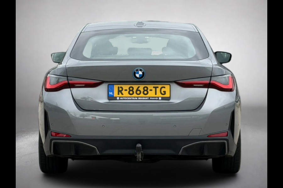 BMW i4 EDrive40 84 kWh 94% SOH (NL-auto,1e eig, Dealer OndH, H&K, Carplay, SfeerV, Trekhaak,Camera, Lane A, Active Cruise, Etc)