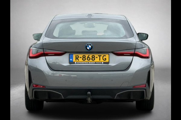 BMW i4 EDrive40 84 kWh 94% SOH (NL-auto,1e eig, Dealer OndH, H&K, Carplay, SfeerV, Trekhaak,Camera, Lane A, Active Cruise, Etc)