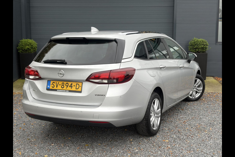 Opel Astra Sports Tourer 1.4 Online Edition ✓2e Eigenaar✓Trekhaak✓Carplay✓Navi✓Recent beurt gehad✓150pk✓Dealer Onderhouden✓6 Bak✓Pdc V+A✓Lm velgen✓Clima✓Cruise✓N.A.P✓Apk tot 06-2027