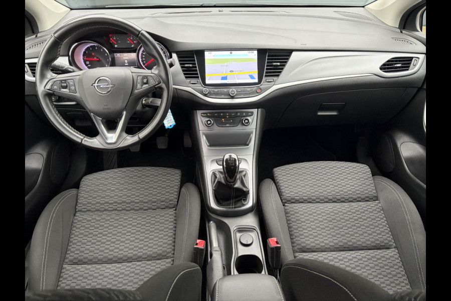 Opel Astra Sports Tourer 1.4 Online Edition ✓2e Eigenaar✓Trekhaak✓Carplay✓Navi✓Recent beurt gehad✓150pk✓Dealer Onderhouden✓6 Bak✓Pdc V+A✓Lm velgen✓Clima✓Cruise✓N.A.P✓Apk tot 06-2027
