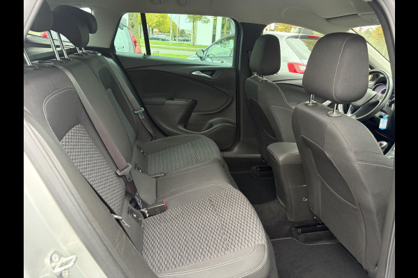 Opel Astra Sports Tourer 1.4 Online Edition ✓2e Eigenaar✓Trekhaak✓Carplay✓Navi✓Recent beurt gehad✓150pk✓Dealer Onderhouden✓6 Bak✓Pdc V+A✓Lm velgen✓Clima✓Cruise✓N.A.P✓Apk tot 06-2027