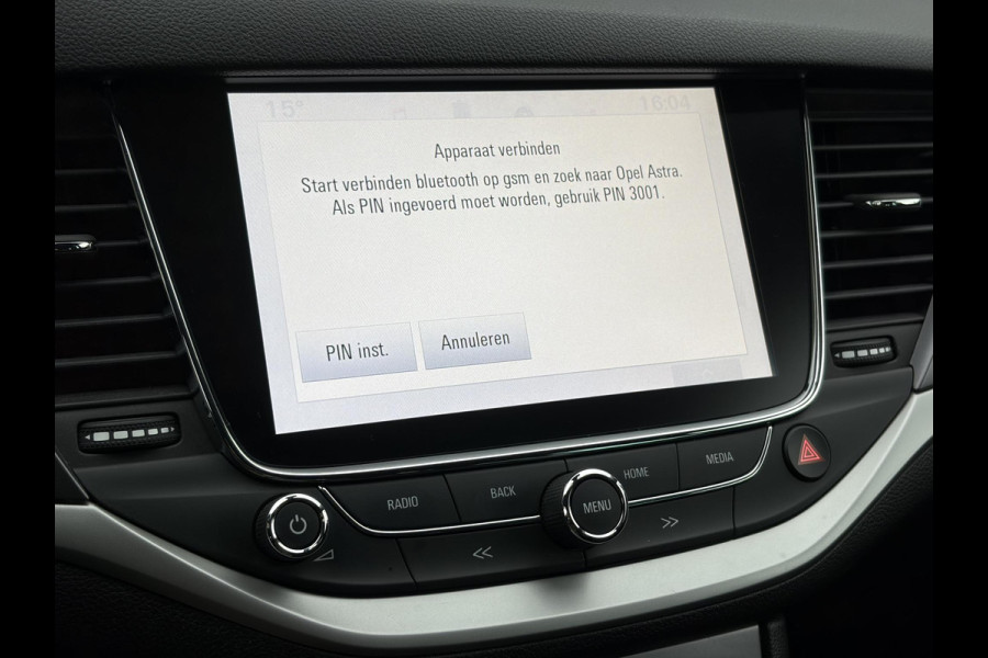 Opel Astra Sports Tourer 1.4 Online Edition ✓2e Eigenaar✓Trekhaak✓Carplay✓Navi✓Recent beurt gehad✓150pk✓Dealer Onderhouden✓6 Bak✓Pdc V+A✓Lm velgen✓Clima✓Cruise✓N.A.P✓Apk tot 06-2027