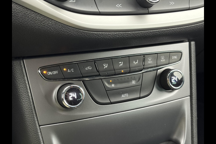 Opel Astra Sports Tourer 1.4 Online Edition ✓2e Eigenaar✓Trekhaak✓Carplay✓Navi✓Recent beurt gehad✓150pk✓Dealer Onderhouden✓6 Bak✓Pdc V+A✓Lm velgen✓Clima✓Cruise✓N.A.P✓Apk tot 06-2027