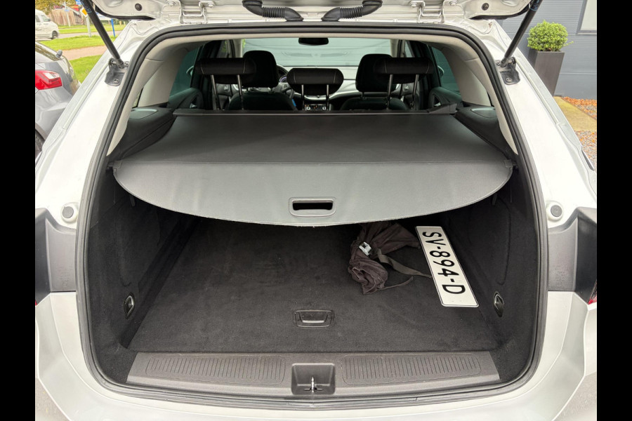 Opel Astra Sports Tourer 1.4 Online Edition ✓2e Eigenaar✓Trekhaak✓Carplay✓Navi✓Recent beurt gehad✓150pk✓Dealer Onderhouden✓6 Bak✓Pdc V+A✓Lm velgen✓Clima✓Cruise✓N.A.P✓Apk tot 06-2027