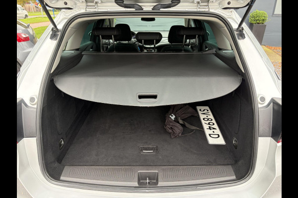 Opel Astra Sports Tourer 1.4 Online Edition ✓2e Eigenaar✓Trekhaak✓Carplay✓Navi✓Recent beurt gehad✓150pk✓Dealer Onderhouden✓6 Bak✓Pdc V+A✓Lm velgen✓Clima✓Cruise✓N.A.P✓Apk tot 06-2027