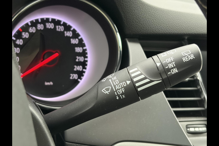 Opel Astra Sports Tourer 1.4 Online Edition ✓2e Eigenaar✓Trekhaak✓Carplay✓Navi✓Recent beurt gehad✓150pk✓Dealer Onderhouden✓6 Bak✓Pdc V+A✓Lm velgen✓Clima✓Cruise✓N.A.P✓Apk tot 06-2027