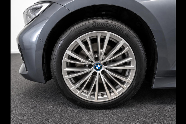 BMW 3 Serie Touring 320e Business Edition Plus Panodak Adaptive Cruise 18" Leder Vernasca PDC VA Laser Light Live Cockpit Premium Audio Sportstoelen