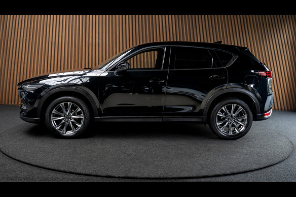 Mazda CX-5 2.5 4WD SkyActiv-G 194 HUD Bose 360 ACC Open dak Stuurverwarming Stoelventilatie Stoelverwarming voor & achter Memory seats Elektr. bedienbare achterklep PDC Climate Control Cruise Control Afneembaar trekhaak LM velgen