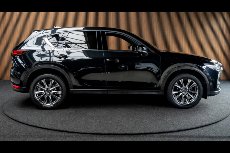 Mazda CX-5 2.5 4WD SkyActiv-G 194 HUD Bose 360 ACC Open dak Stuurverwarming Stoelventilatie Stoelverwarming voor & achter Memory seats Elektr. bedienbare achterklep PDC Climate Control Cruise Control Afneembaar trekhaak LM velgen