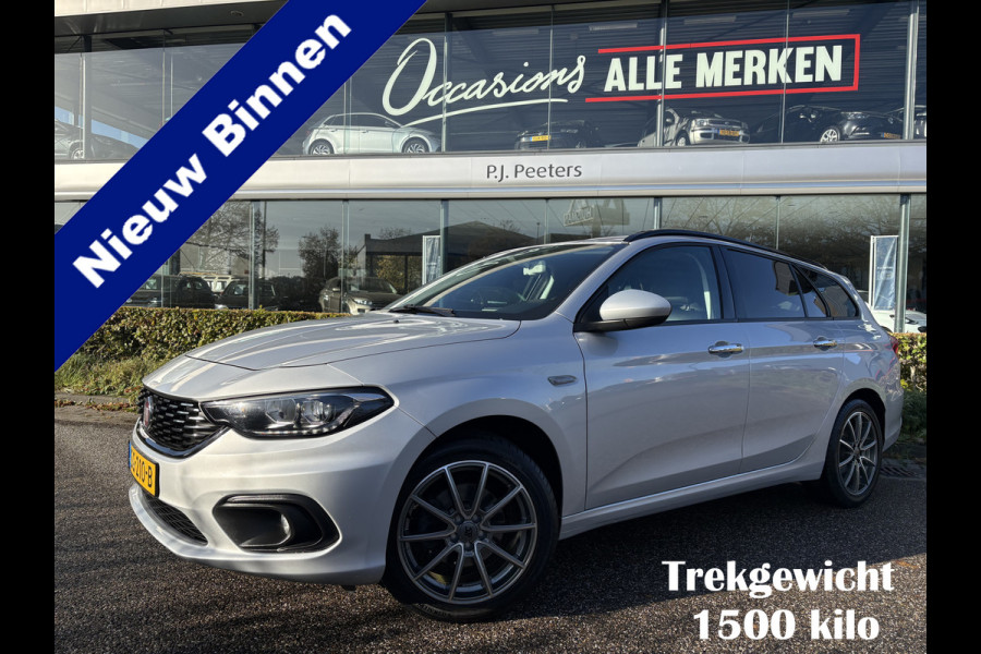 Fiat Tipo Stationwagon 1.4 T-Jet 16v Business Trekhaak - Achteruitrijcamera - Airco - Parkeersensoren achter - Stoelverwarming - Navigatie - Bluetooth - Cruise control - Dakrails - Radio - Start/stop systeem - Stuur multifunctioneel - Licht metalen velgen 17 inch - Led verlichting - Elektrische ramen - Centrale vergrendeling met afstandsbediening