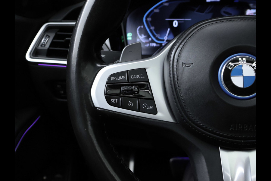 BMW 3 Serie Touring 330e High Executive Sport SOH 90,5% (PANORAMADAK,APPLE CARPLAY,NAVI,CAMERA,SFEERVERLICHTING,LED,SPORTSTOELEN)
