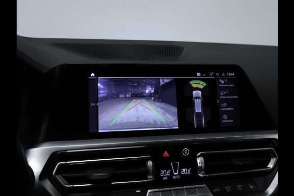 BMW 3 Serie Touring 330e High Executive Sport SOH 90,5% (PANORAMADAK,APPLE CARPLAY,NAVI,CAMERA,SFEERVERLICHTING,LED,SPORTSTOELEN)