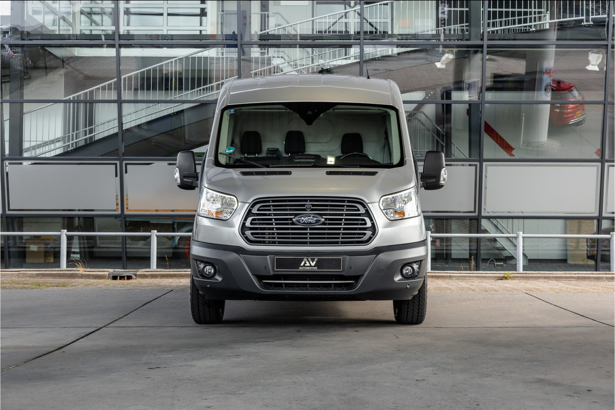 Ford Transit 310 2.0 TDCI L2H2 | CarPlay | Navigatie | Camera | BOTT Inrichting | Airco | 3-Zitter | Cruise control