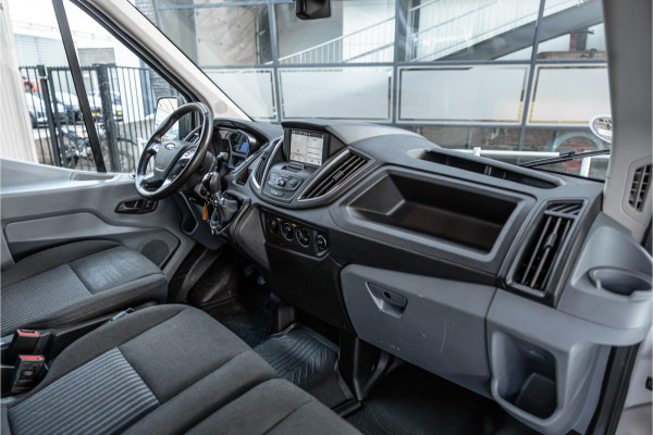 Ford Transit 310 2.0 TDCI L2H2 | CarPlay | Navigatie | Camera | BOTT Inrichting | Airco | 3-Zitter | Cruise control