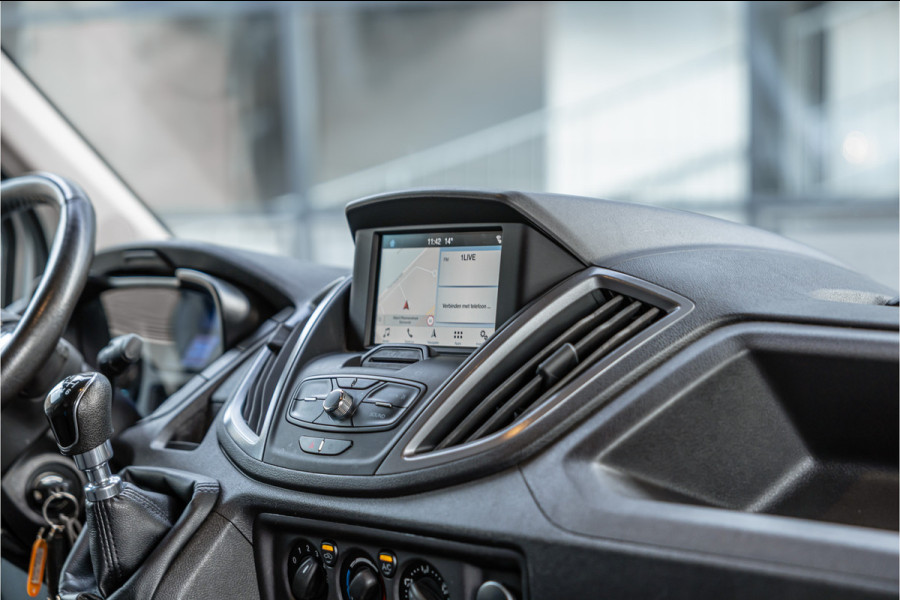 Ford Transit 310 2.0 TDCI L2H2 | CarPlay | Navigatie | Camera | BOTT Inrichting | Airco | 3-Zitter | Cruise control
