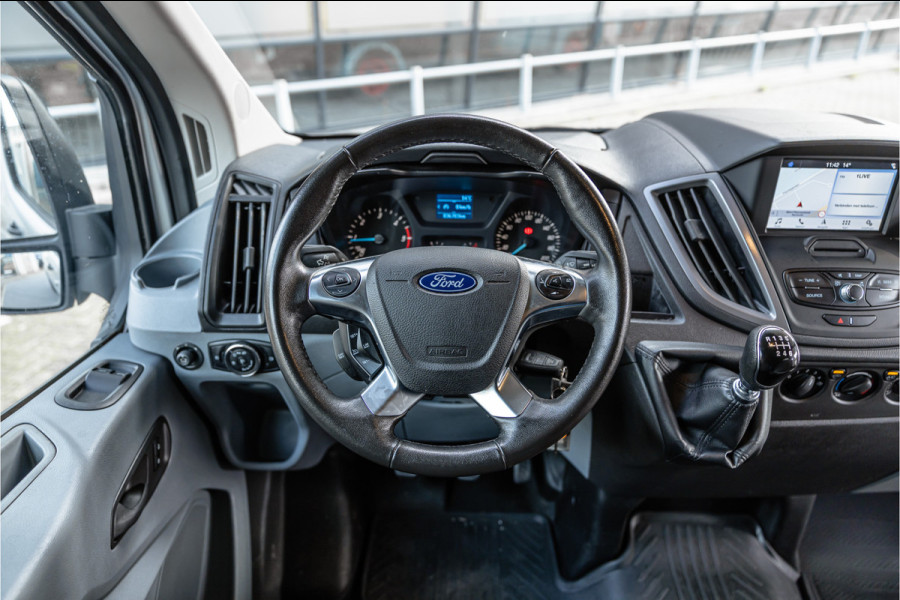 Ford Transit 310 2.0 TDCI L2H2 | CarPlay | Navigatie | Camera | BOTT Inrichting | Airco | 3-Zitter | Cruise control