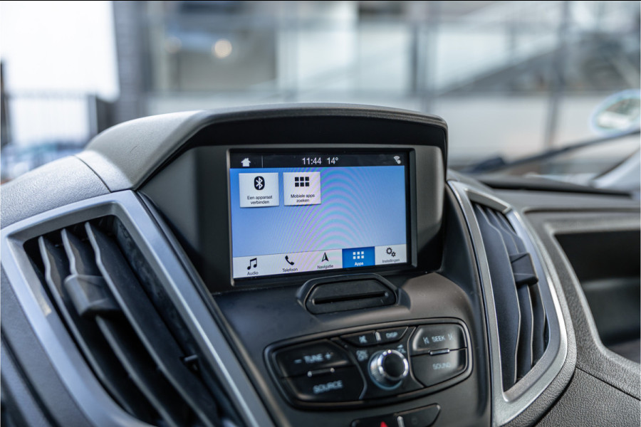 Ford Transit 310 2.0 TDCI L2H2 | CarPlay | Navigatie | Camera | BOTT Inrichting | Airco | 3-Zitter | Cruise control